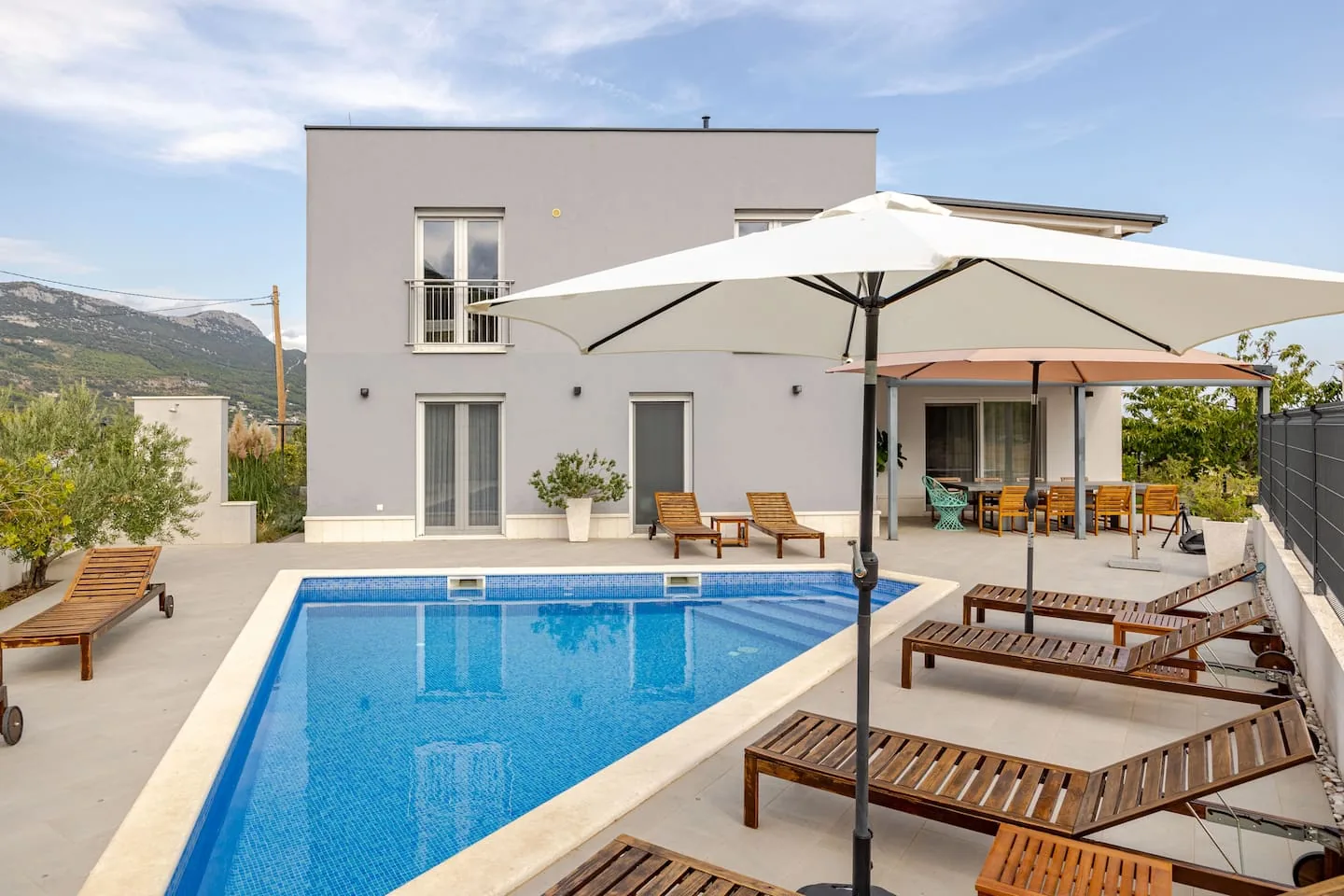 Poolside parasol and dining